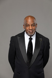 Pastor Glass in black tuxedo - close-up portrait